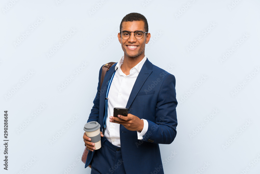 Businessman over isolated blue background