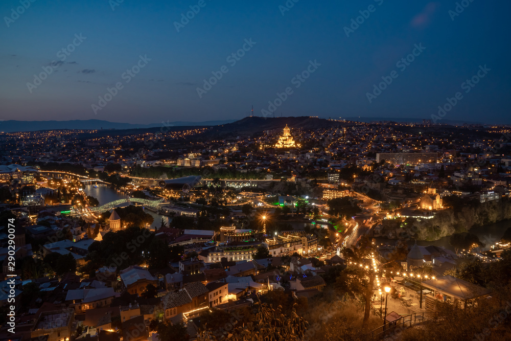 Night view of Tbilisi with Sameba (Trinity) Church and other landmarks. Beautiful Place to travel.
