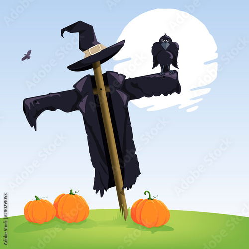 Raven perching on a scarecrow