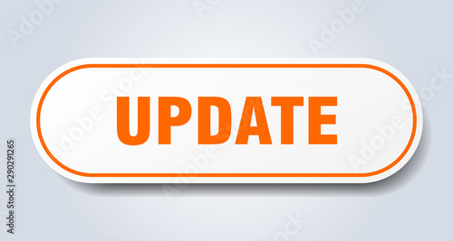 update sign. update rounded orange sticker. update