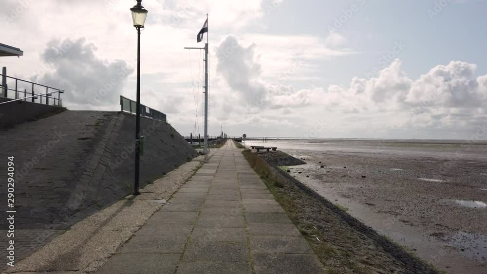 Schiermonnikoog Harbor and Wadden sea at low tide Schiermonnikoog Harbor and Wadden sea at low tide