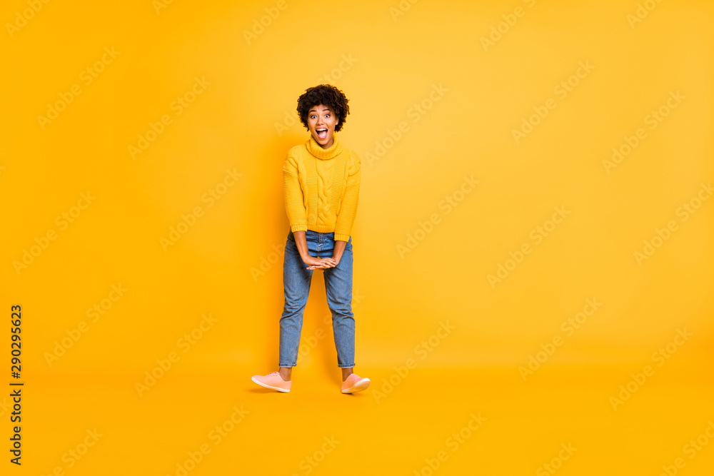 Full length body size view of nice attractive cheerful cheery funky childish crazy wavy-haired girl having fun leisure isolated over bright vivid shine vibrant yellow color background