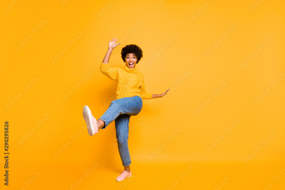 Full length body size view of nice attractive cheerful crazy funky childish comic wavy-haired girl having fun time rejoicing fooling isolated on bright vivid shine vibrant yellow color background