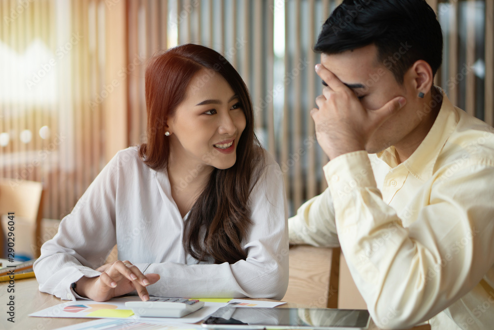 Happy Asian couples be smile after calculating income And expenses because it receives profits from investments. Concepts for investment planning and financial planning for the family. Happy Asian couples be smile after calculating income And expenses because it receives profits from investments. Concepts for investment planning and financial planning for the family.