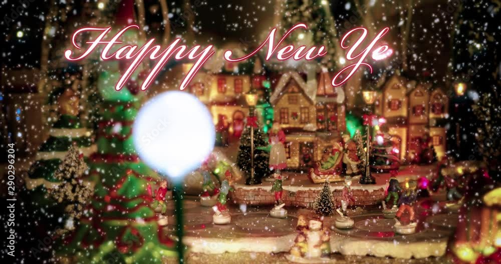 Happy New Year text typography design in red with christmas village’s toy scene and little figurines of ice-skaters in the background under the snow - New year and Christmas event concept Happy New Year text typography design in red with christmas village’s toy scene and little figurines of ice-skaters in the background under the snow - New year and Christmas event concept