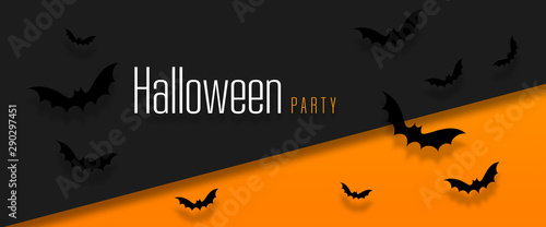 Happy halloween banner with bats flying over orange background. Autumn holiday composition.