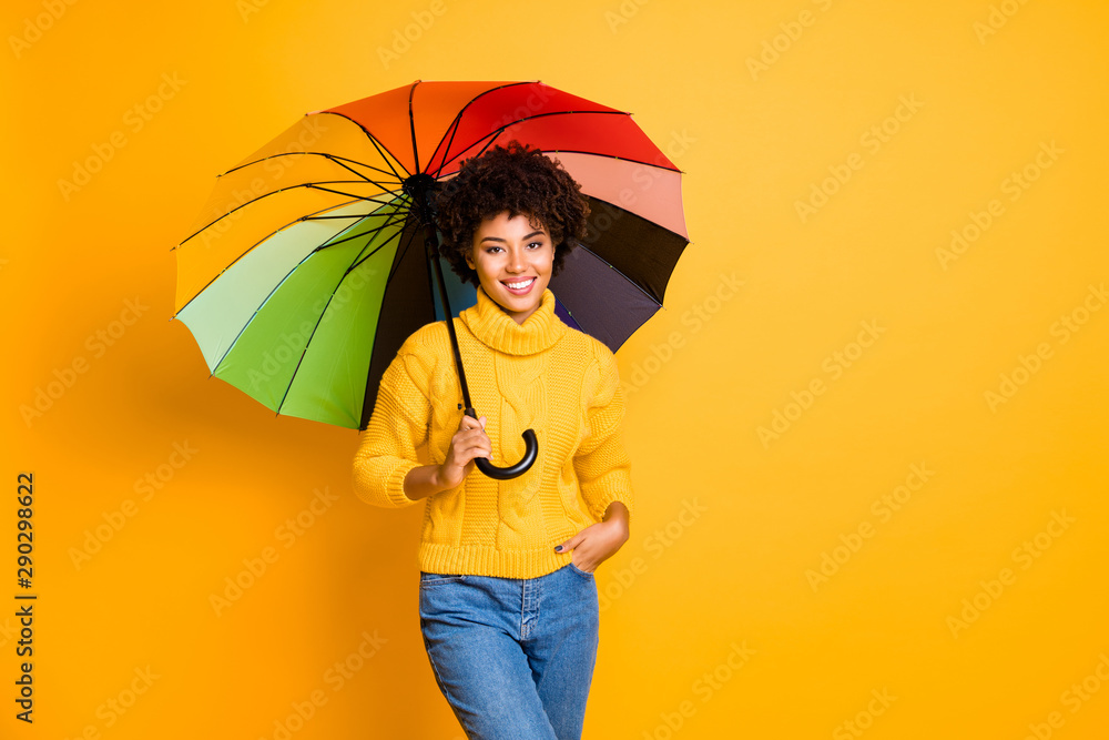 Rainy day is not a problem concept. Photo of positive optimistic cheerful  confident feeling in safety pretty hipster person holding open parasol in  hand wearing jeans isolated vivid background Stock Photo