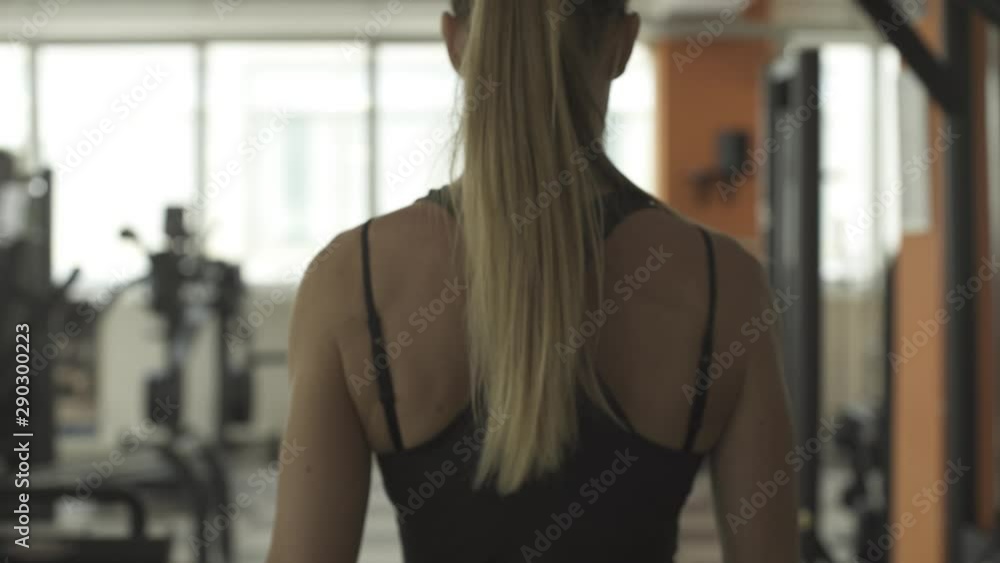 Athletic woman sitting at the gym Athletic woman sitting at the gym