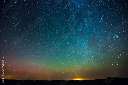 Starry sky with light Aurora borealis lights photo