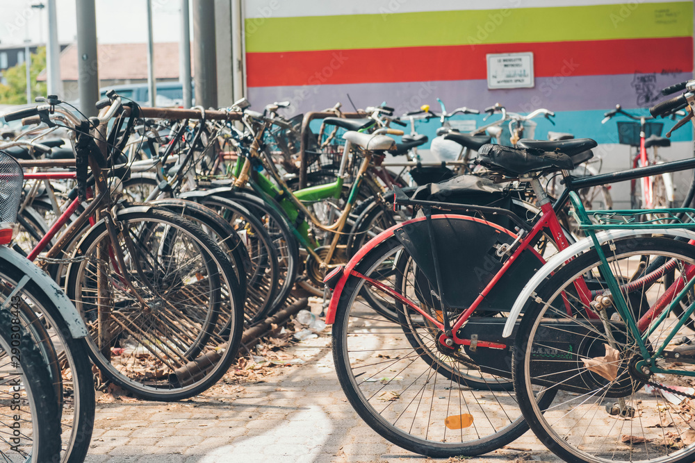 Bicycle parking area with a lot of colorful bicycles. Bicycle parking area with a lot of colorful bicycles.