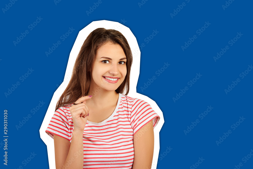 Portrait of a young seductive brunette smiling at the camera. emotional girl Magazine collage style with trendy color background Portrait of a young seductive brunette smiling at the camera. emotional girl Magazine collage style with trendy color background