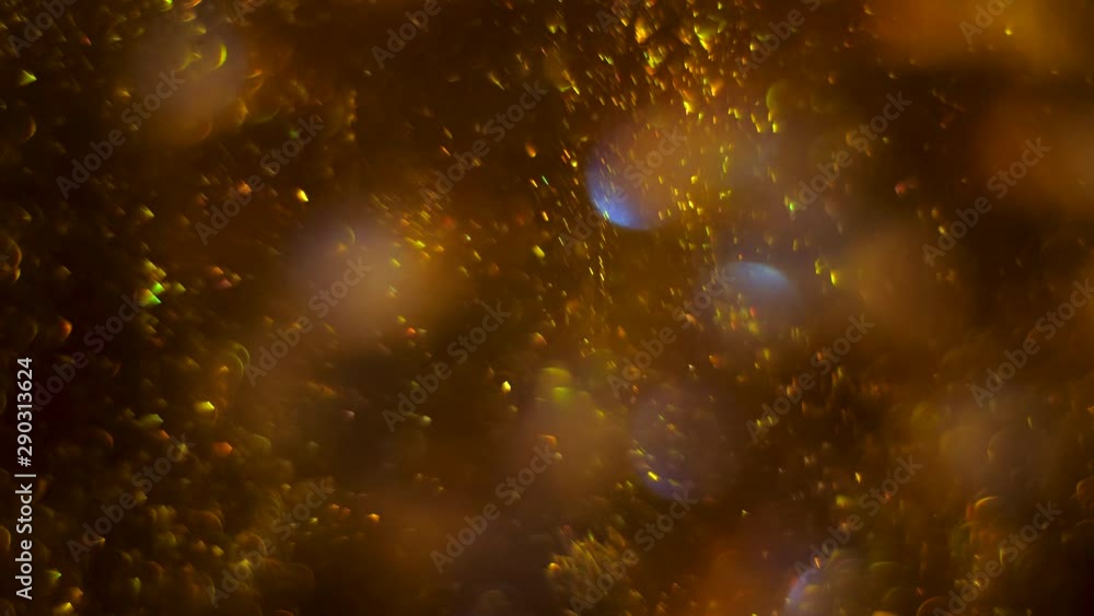 Gold magical blinking bokeh particles like bubbles. Glitter moving space dust. Seamless loop abstract background. Gold magical blinking bokeh particles like bubbles. Glitter moving space dust. Seamless loop abstract background.