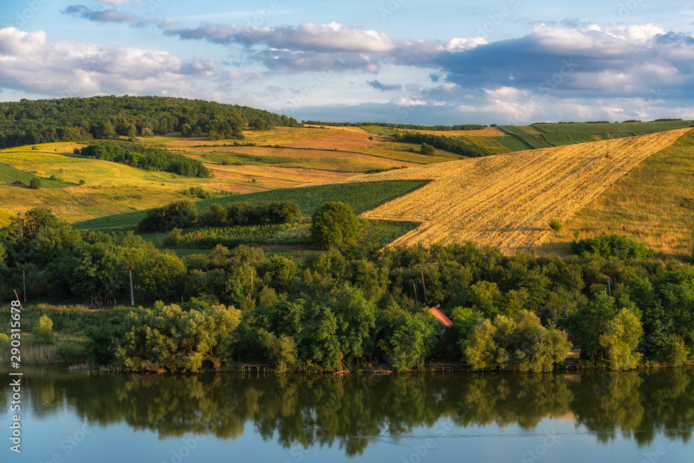 Countryside lake with reflections summer-time 