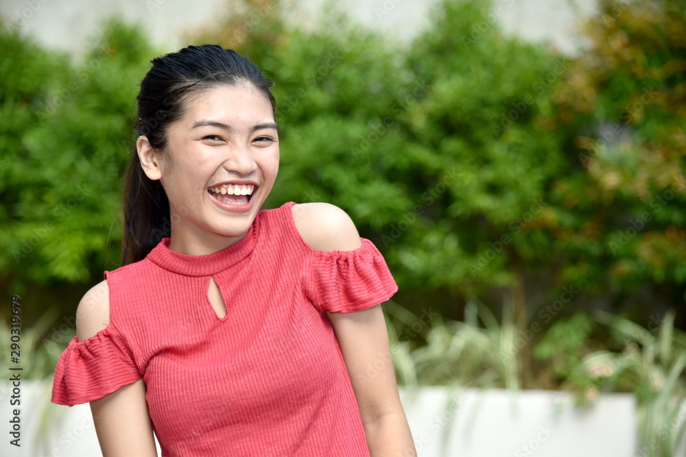 An A Filipina Female Laughing