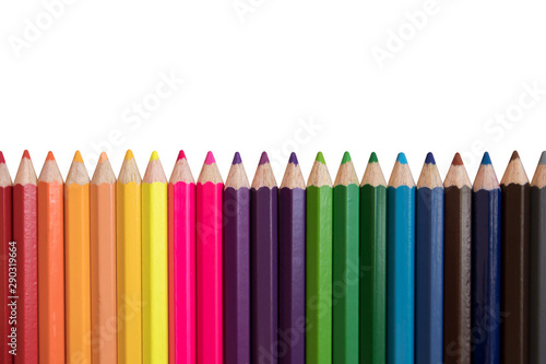 Colored pencils of various colors on a white background