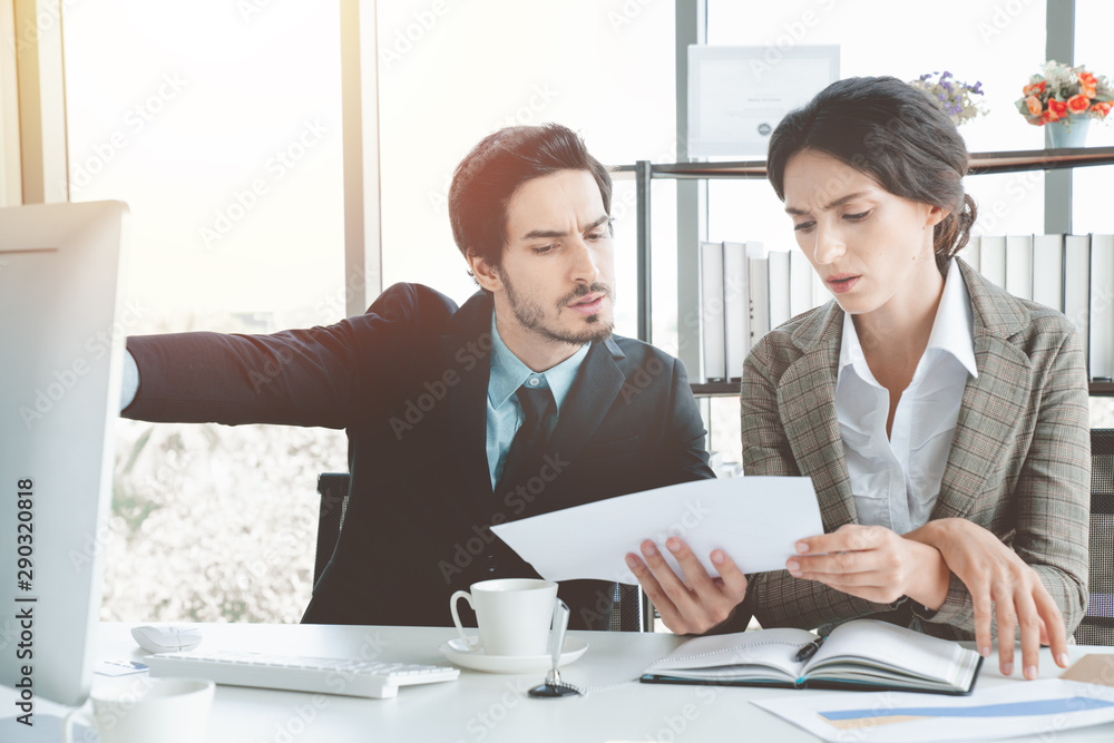 Stressed overwhelmed businessmen are discussing as a team briefing, stress at work concept Stressed overwhelmed businessmen are discussing as a team briefing, stress at work concept