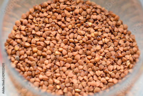 Macro Photo food buckwheat groats. Texture background grain buckwheat groats. Image food product porridge buckwheat
