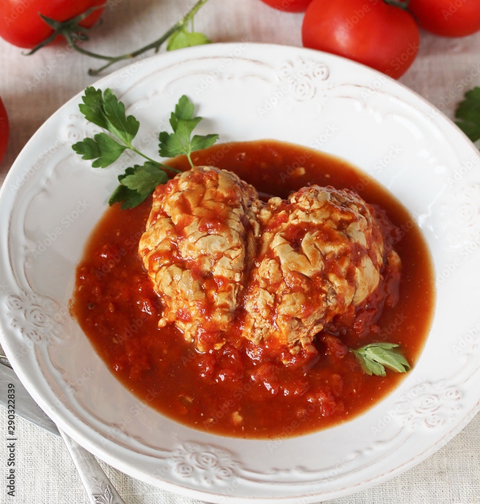 brains of a cow, sheep or calf in tomato sauce. dishes with offal. dish