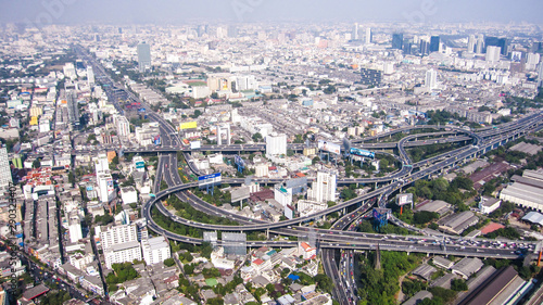 multilevel interchanges surrounded by houses in a big city in Asia