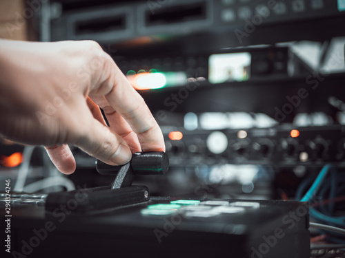 Принти на полотні Close up hand on video switcher panel