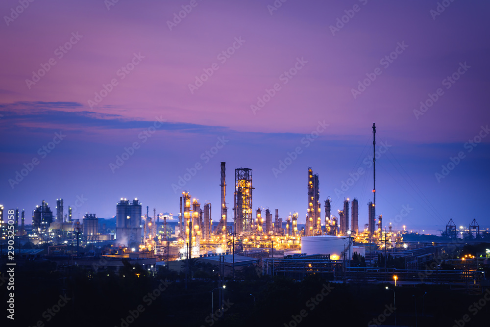 Manufacturing of petroleum industrial plant on twilight sky background