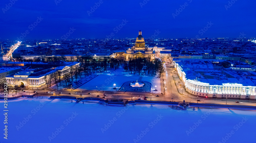 Fototapeta premium Winter in Russia. Evening Petersburg. Panorama of the city from a height. Sights Of St. Petersburg. Isaakievsky cathedral. Bronze horseman. Neva embankment. Visit card of the city.