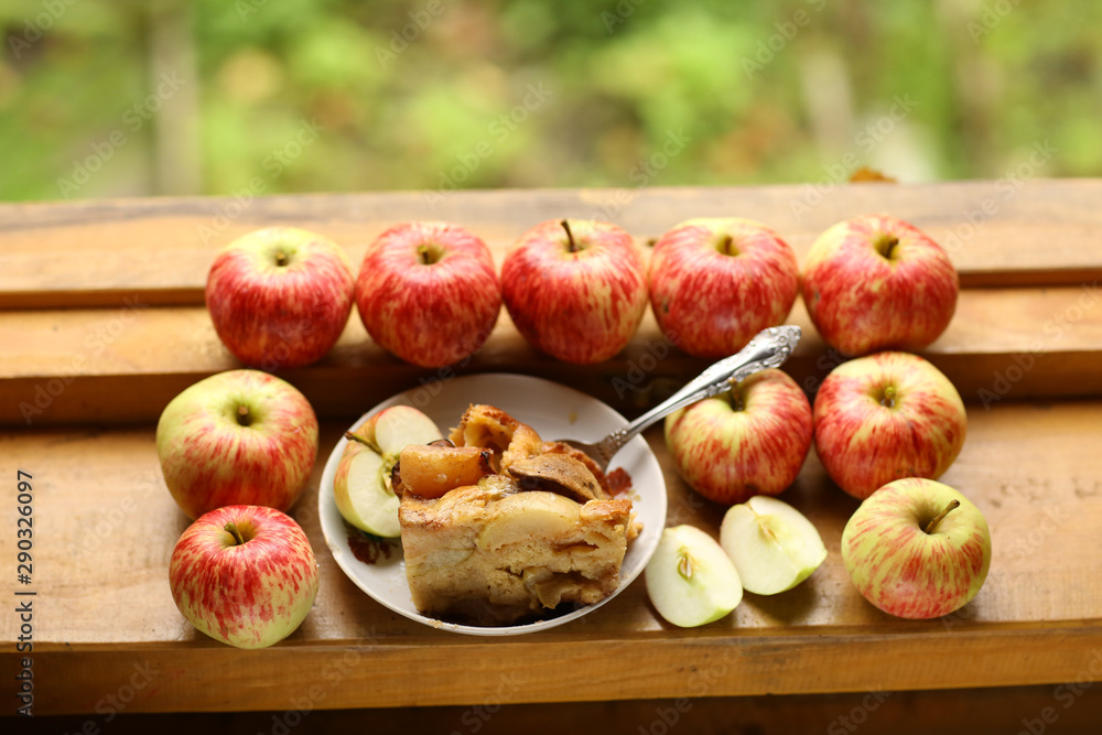 pieces of fresh baked apple pie among raw apples country style still life pieces of fresh baked apple pie among raw apples country style still life