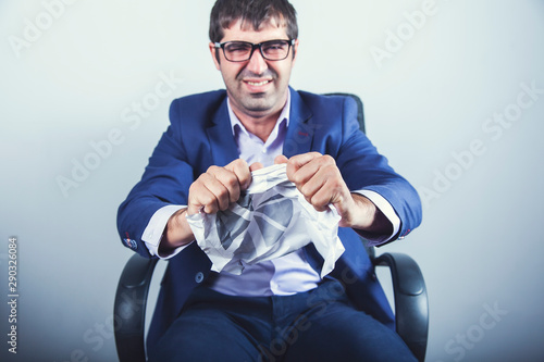 man hand crumpled document