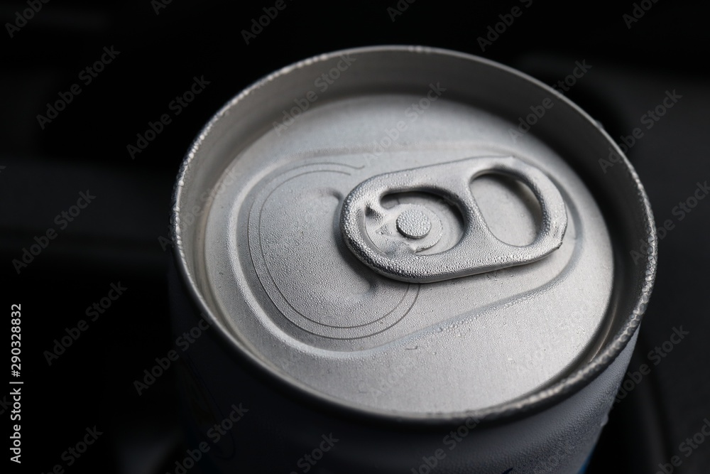 Aluminum can with water drops in dark background Aluminum can with water drops in dark background