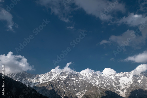 Snowy peaks of the Himalayas. Travelling to Himachal Pradesh. View from the mountain pass Triund. © 70200