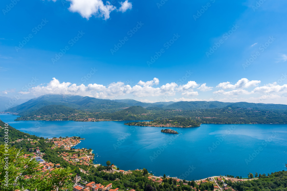 Panorama of Lake Orta in Piedmont (Piemonte), Italy with the St. Julius Island (Isola di San Giulio) and the town of Orta San Giulio in the center