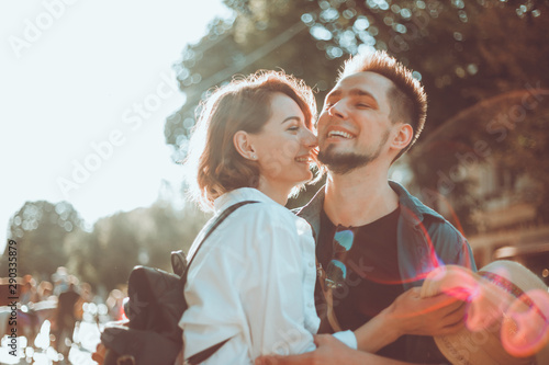 Romantic youth concept. Young stylish hipster couple in love at the city.