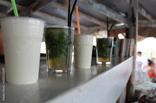 Mojito and milkshake at the bar. Refreshment. Drinks on vacation with children.