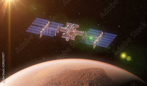 Fototapeta Naklejka Na Ścianę i Meble -  3d rendered illustration of a space station in orbit of mars