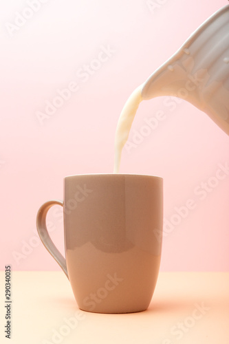 Fresh milk in colored cups