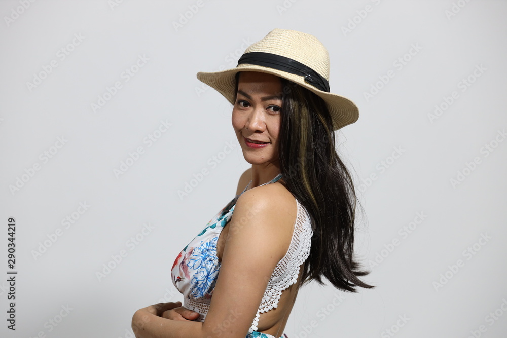 Beautiful asian woman smiles from profile Beautiful asian woman smiles from profile