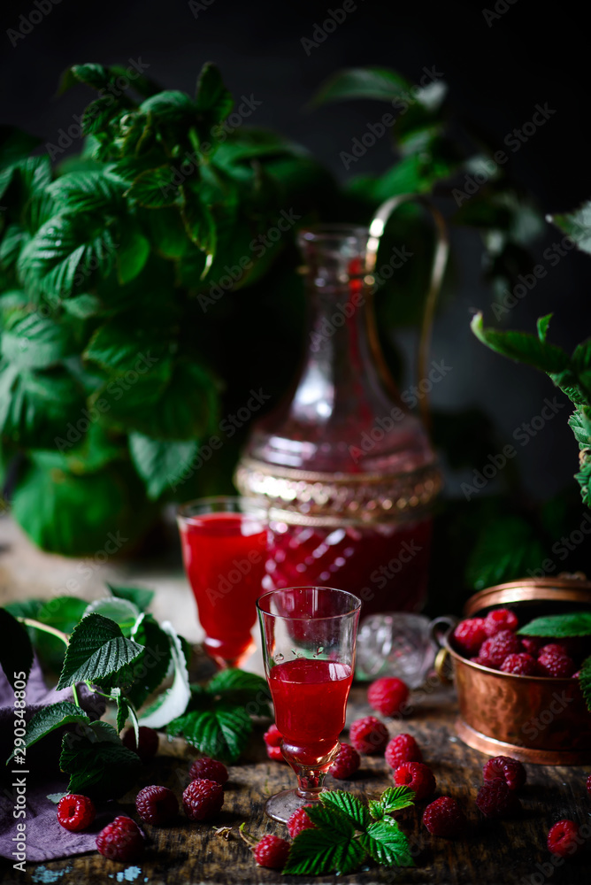 raspberry liquor...style rustic. selective focus raspberry liquor...style rustic. selective focus