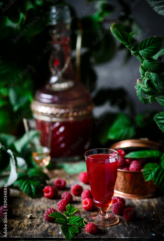 raspberry liquor...style rustic. selective focus raspberry liquor...style rustic. selective focus