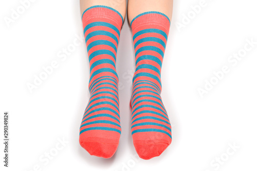 Woman in orange socks isolated on white background. Top view.