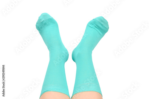 Woman in blue socks isolated on white background. Top view.