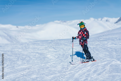 Young Skier on Top of Ski Resort