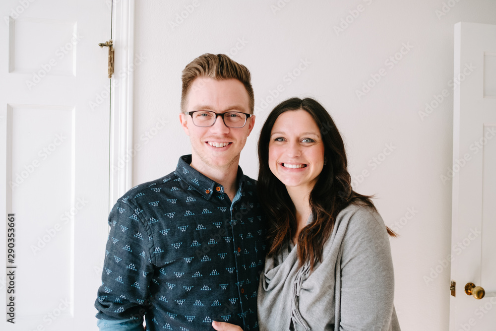 portrait of couple posing in home portrait of couple posing in home