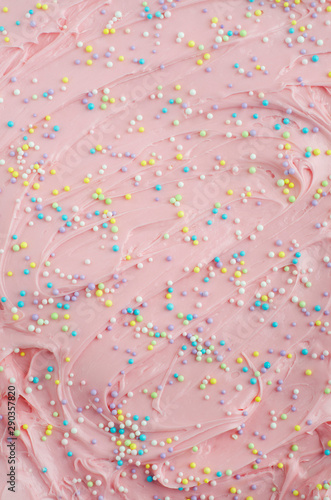 pink frosting with sprinkles photo