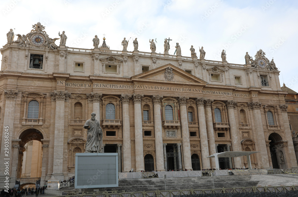 Wide Basilica of St Peter in Vatican City and the big Statue of