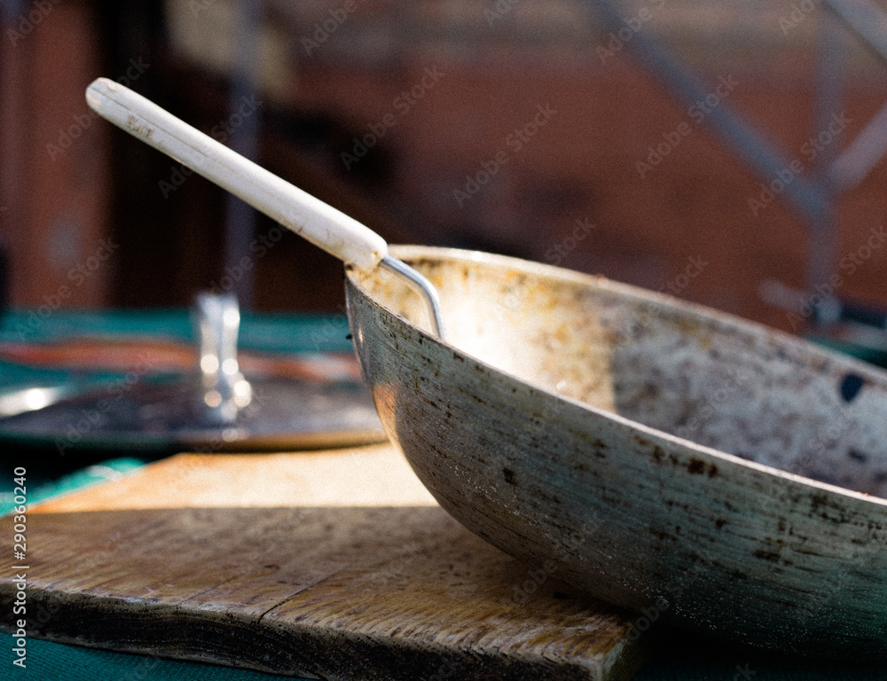 Kupaty in a frying pan on a wooden table. Stock Photo by ©Enika100 284381520