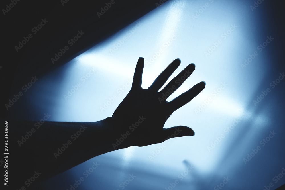 Creepy hand silhouette concept for Halloween.