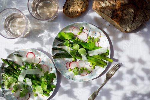 Early summer salad of asparagus, radish, peas, pea shoots and pecorino.