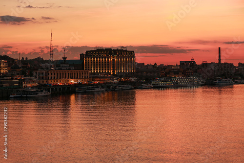KYIV, UKRAINE - JUNE 03, 2019: Beautiful view of embankment and Dnipro river at sunset