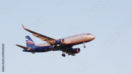 Fototapeta Naklejka Na Ścianę i Meble -  MOSCOW , RUSSIA, June 10, 2019: The Commercial passenger airplane flying overhead on sunny day on June 10, 2019 in Moscow, Russia