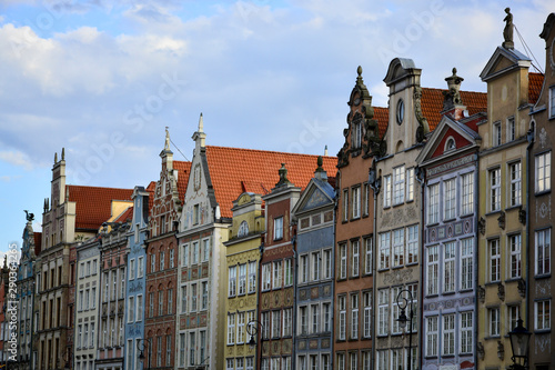 Colorful tenament houses facades in old city.